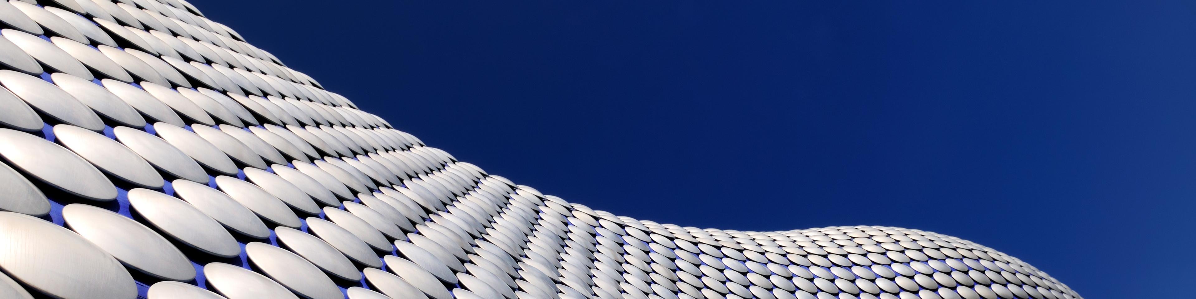 A wide angle view of the very modern and iconic Bullring building in Birmingham