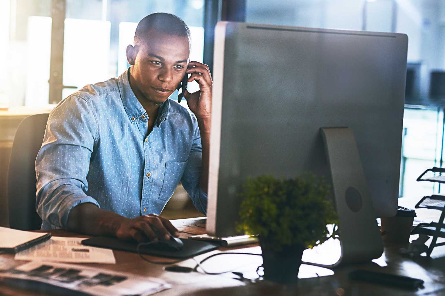 Man works at desktop