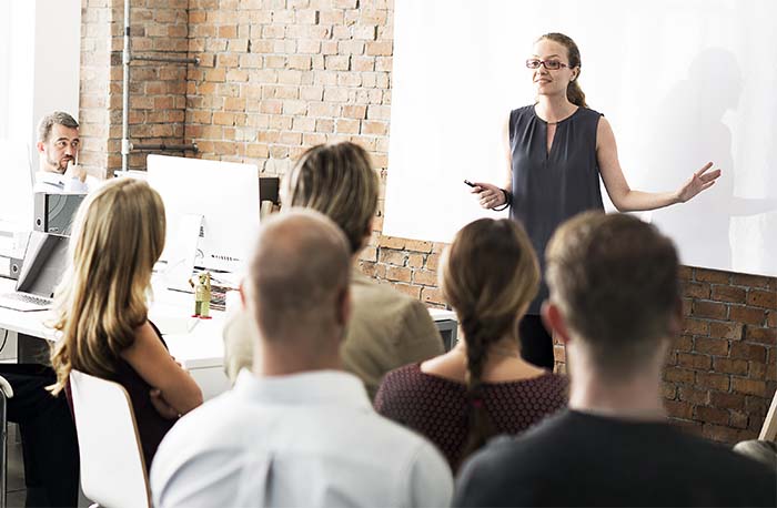 woman-talking-to-group