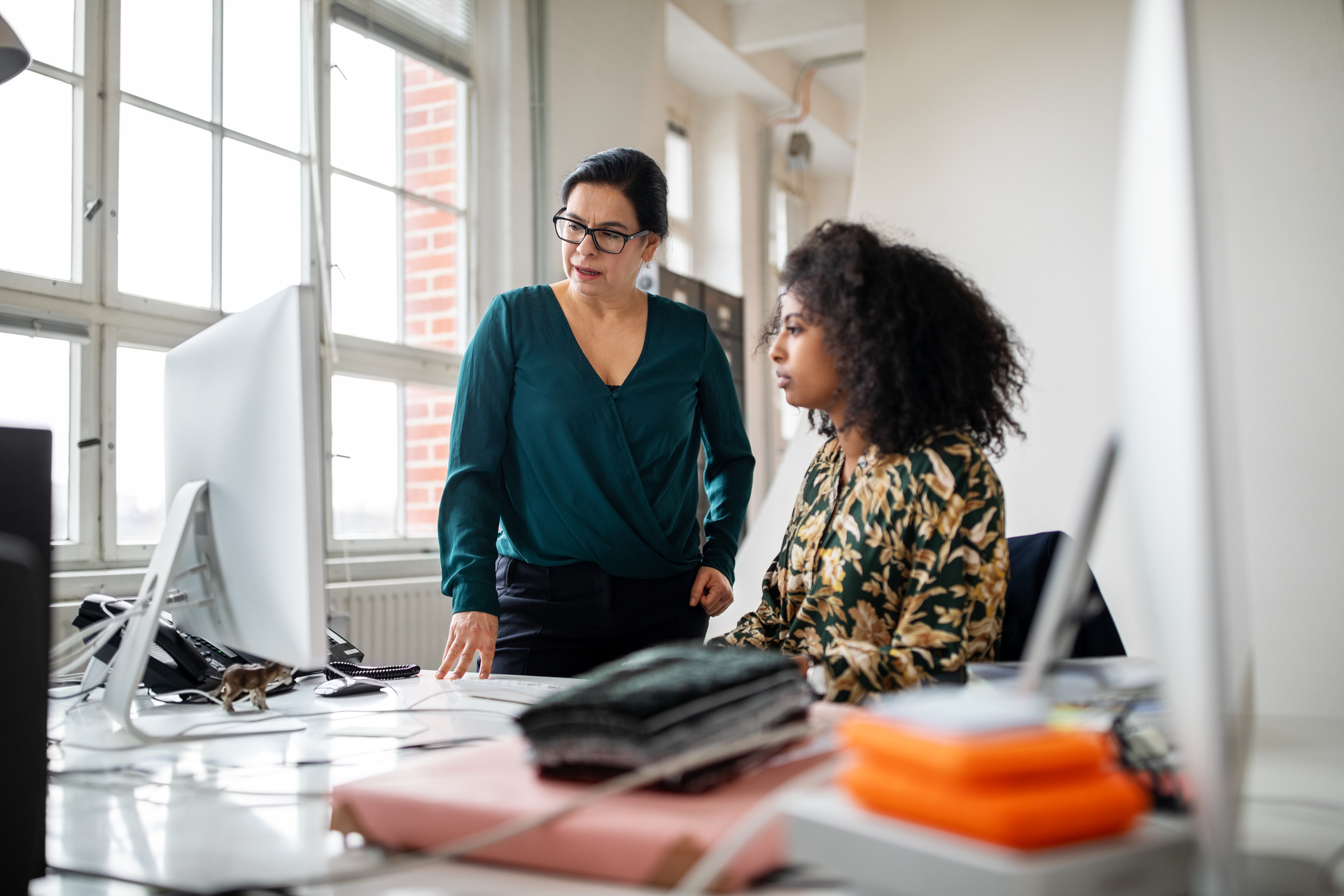 Women interacting at Workstation