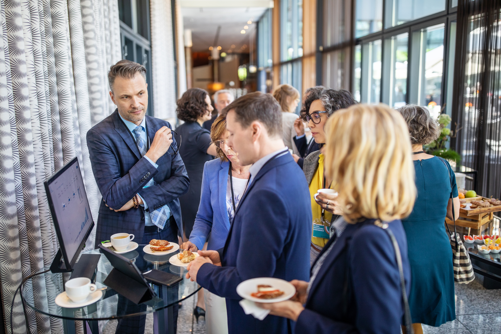 Business people discussing during a break in seminar