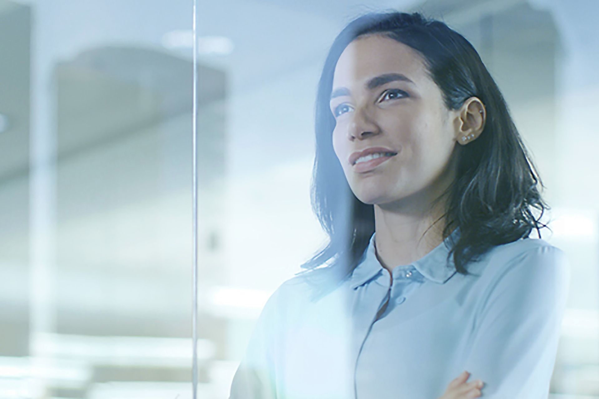 Woman behind glass