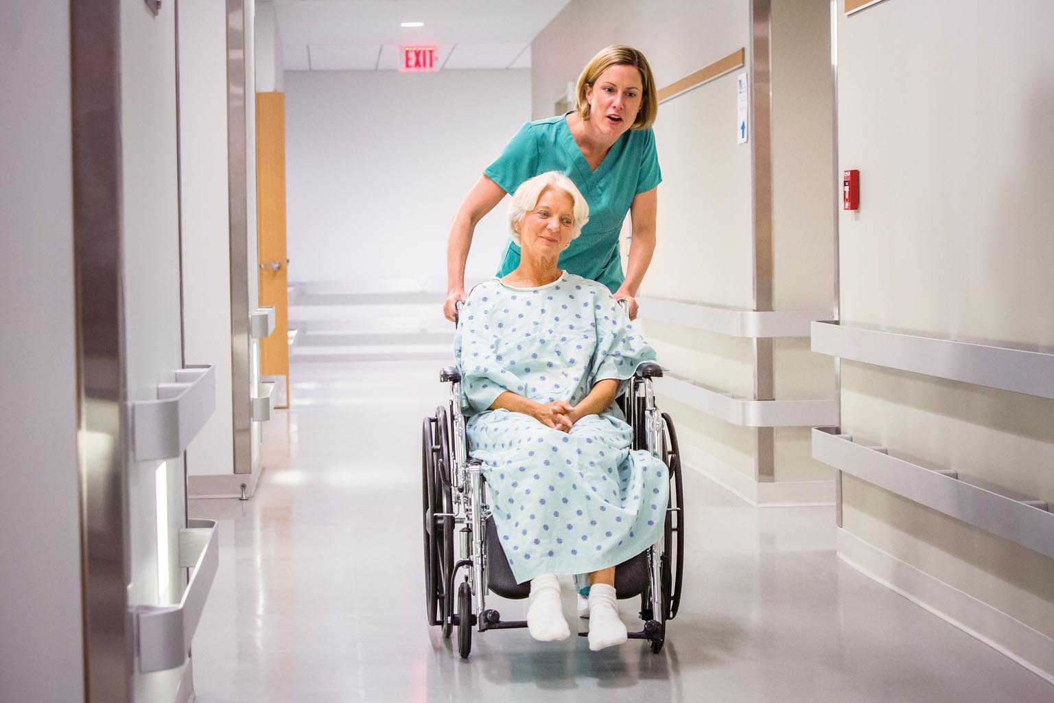nurse with elderly patient in wheelchair
