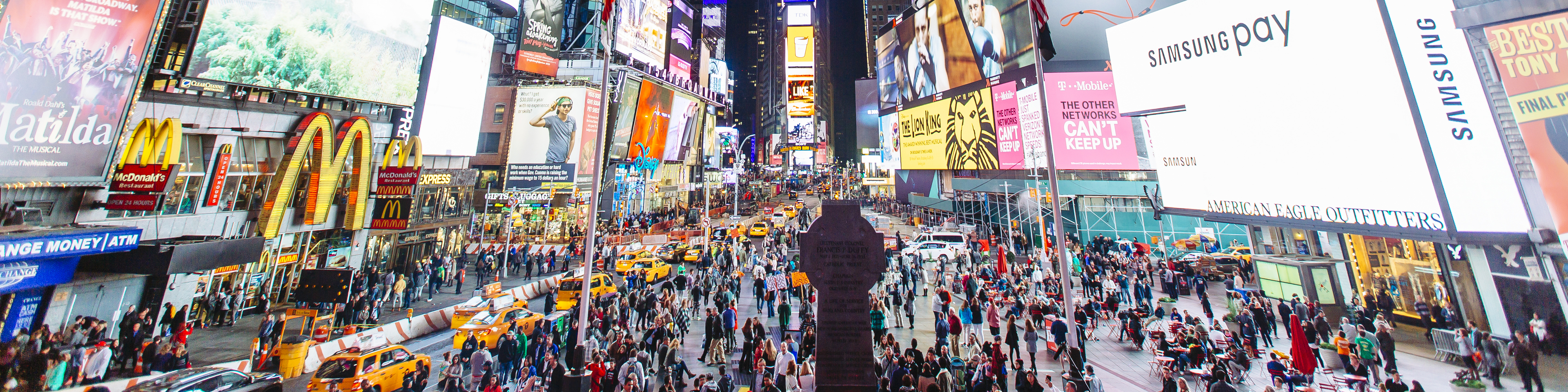 Times Square with illuminated billboards and advertisement at night, New York City, USA,