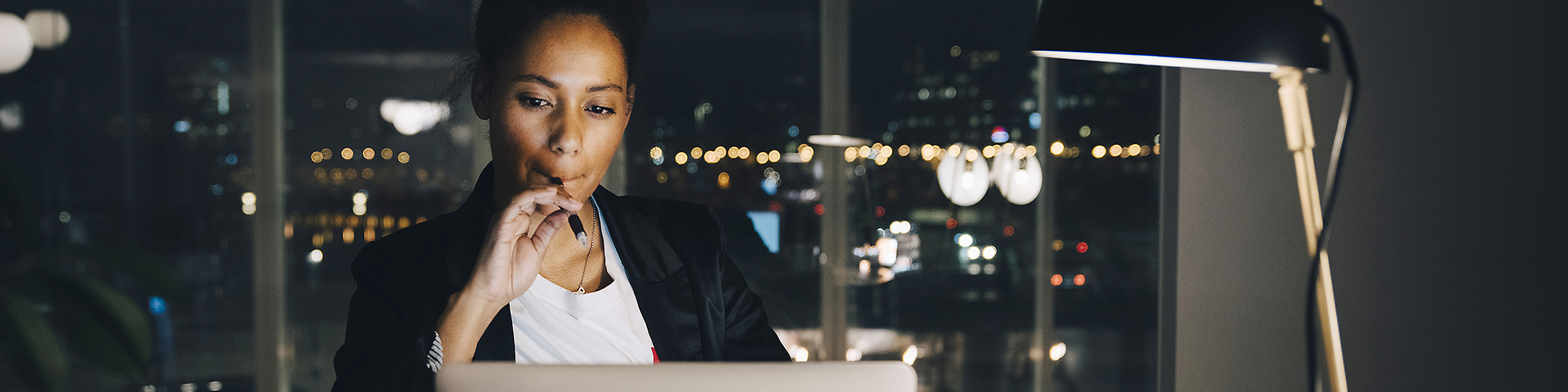 businesswoman burning the midnight oil