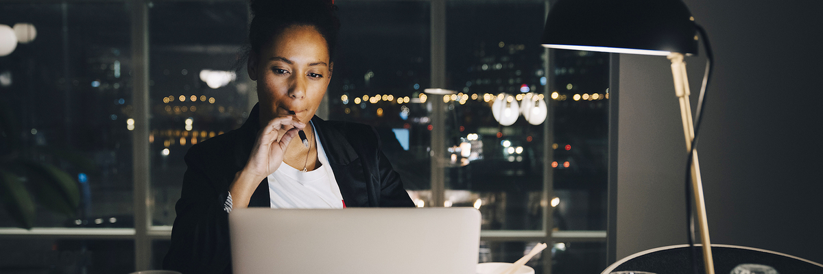 businesswoman burning the midnight oil