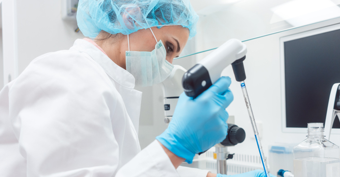 Laboratory technician working with lab sample