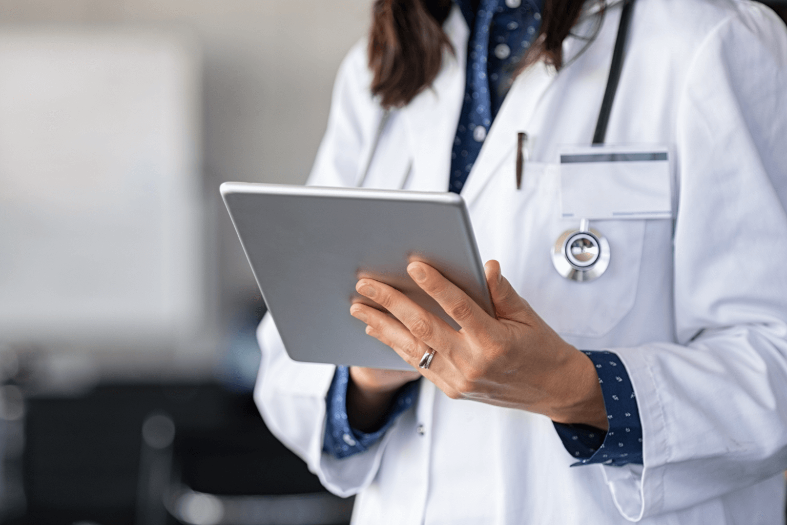 Close-up-of-woman-doctor-hands-using-digital-tablet-at-clinicjpg