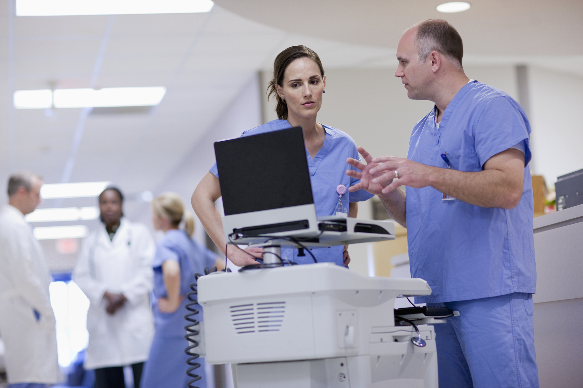 Nurses looking at digital chart