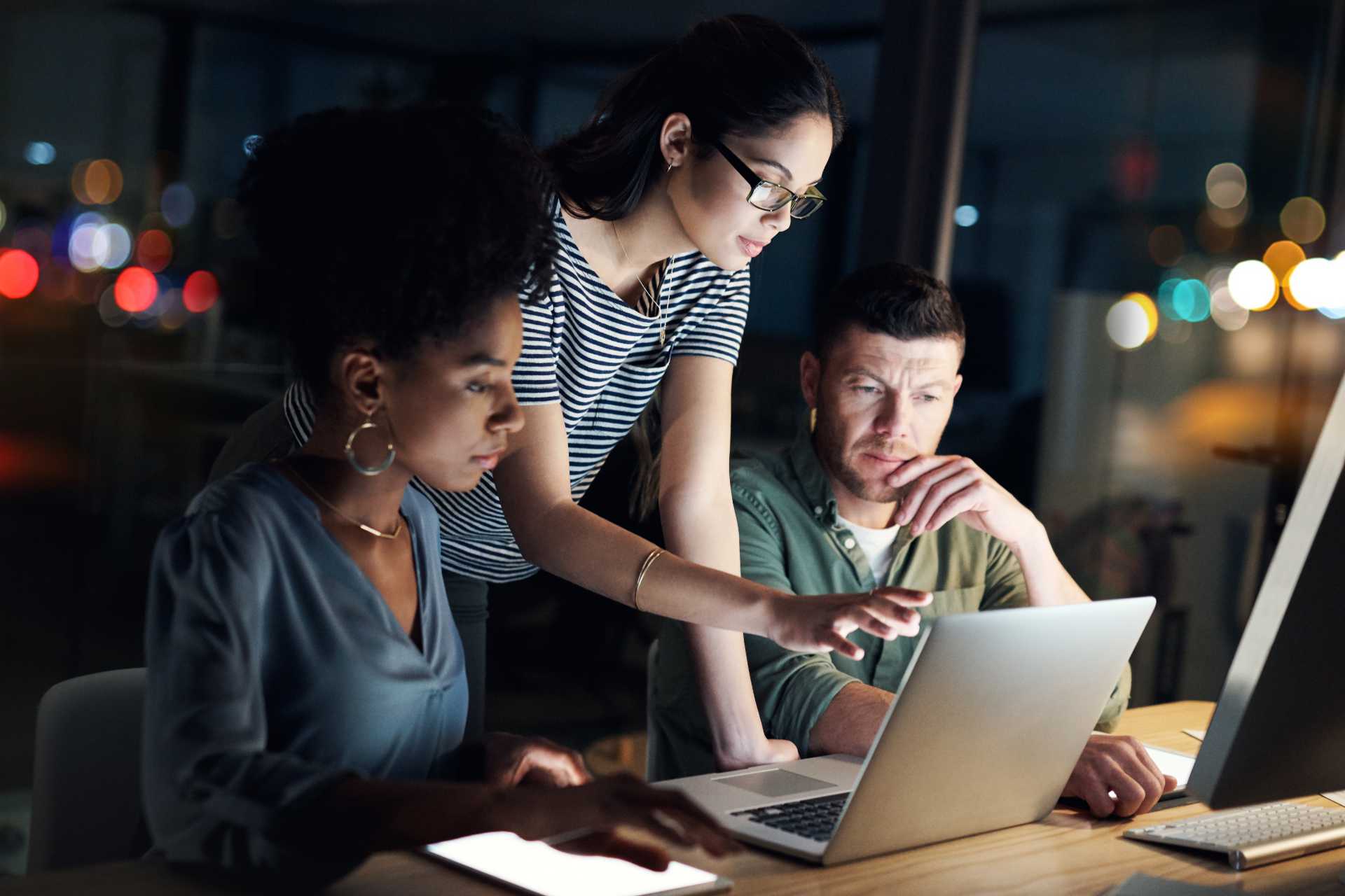 Group looks at laptop