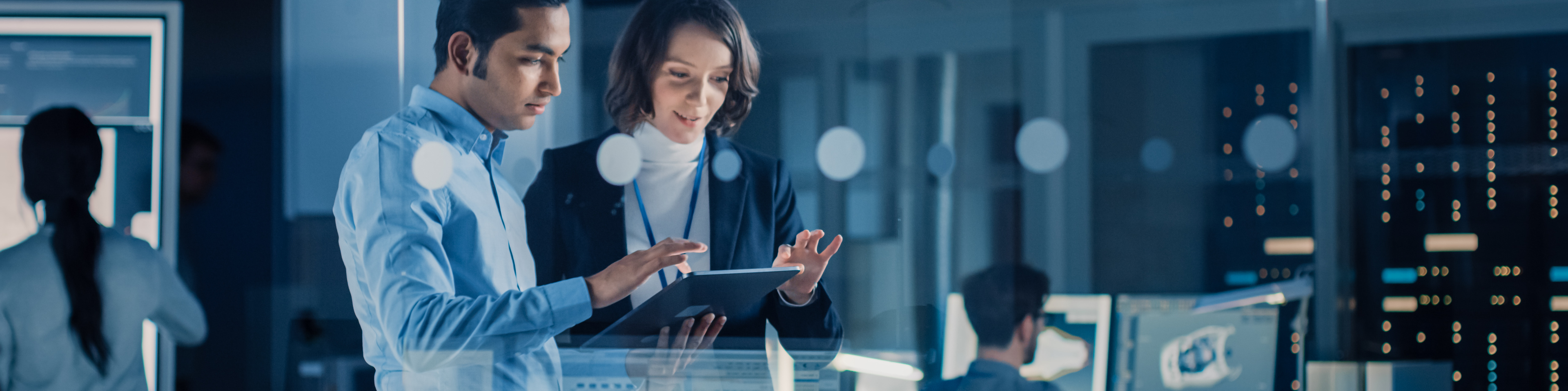 Female Project Manager Talks With Chief Engineer