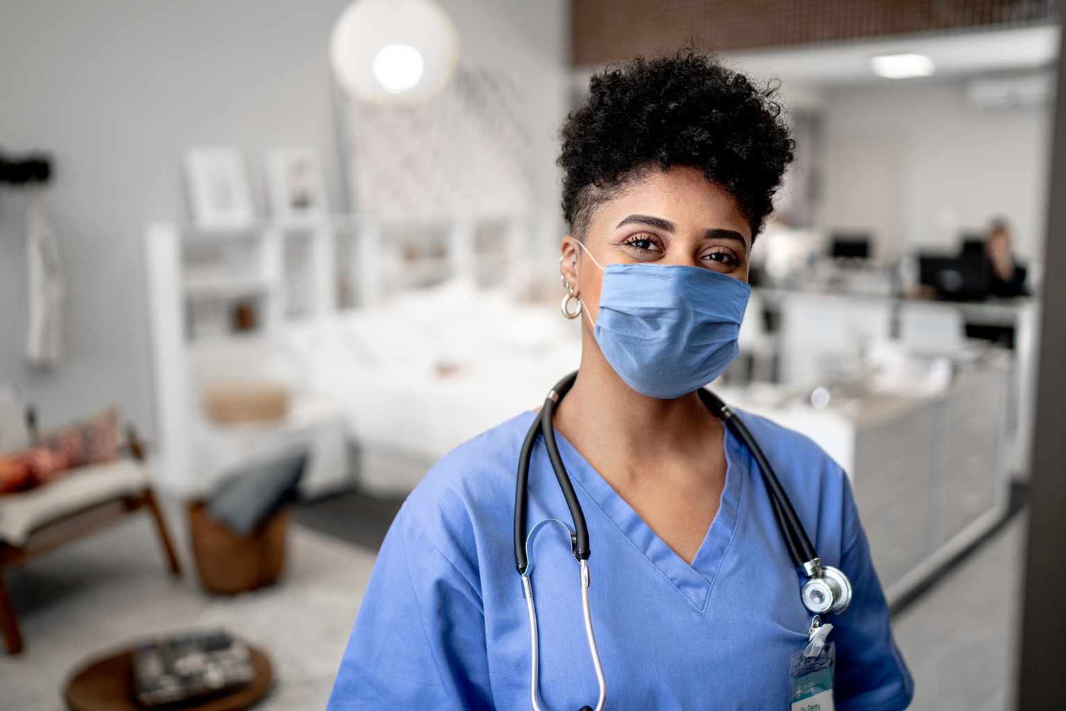 A doctor wearing mask in her resting room during pandemic