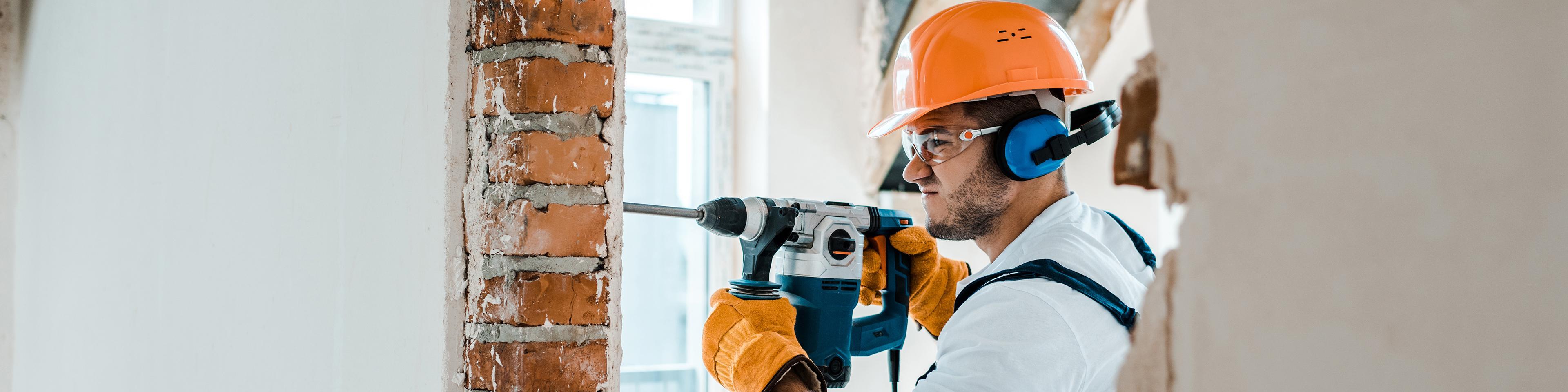 Demolition on a brick wall by a contractor or handyman