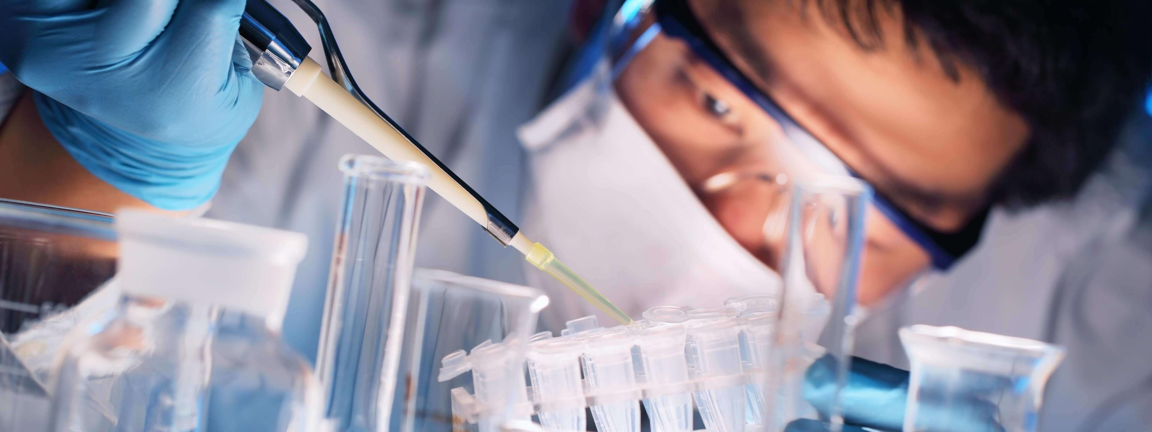 Scientist holds and examine samples