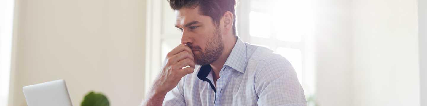 Man looking at a computer screen