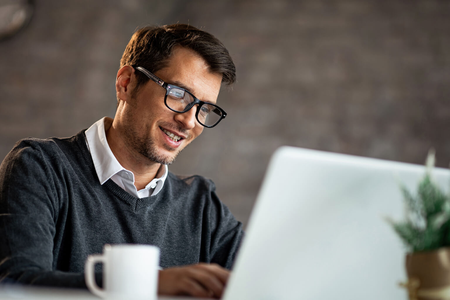 Caucasian man on laptop