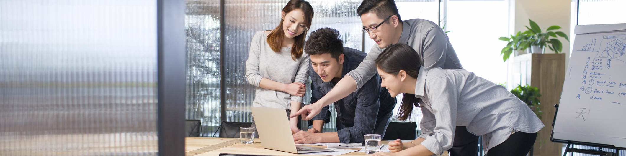 Asian business people having meeting in board room