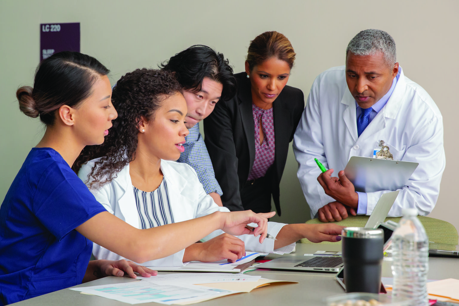 Medical staff having a briefing in the meeting room