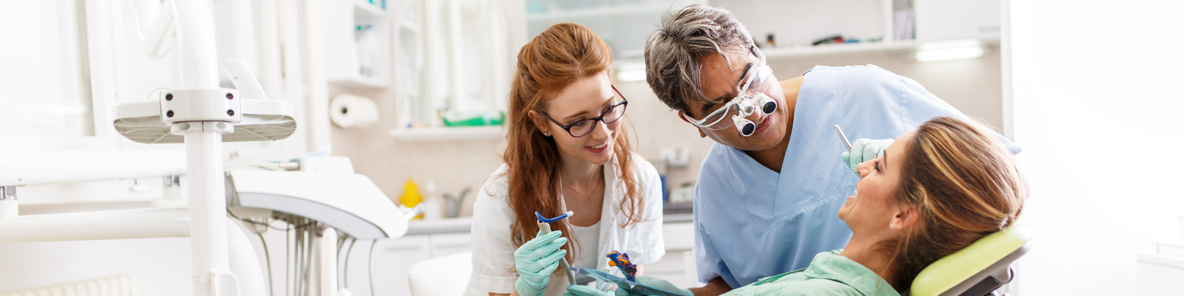 Dentists-and-their-patient-in-dentist-office.jpeg