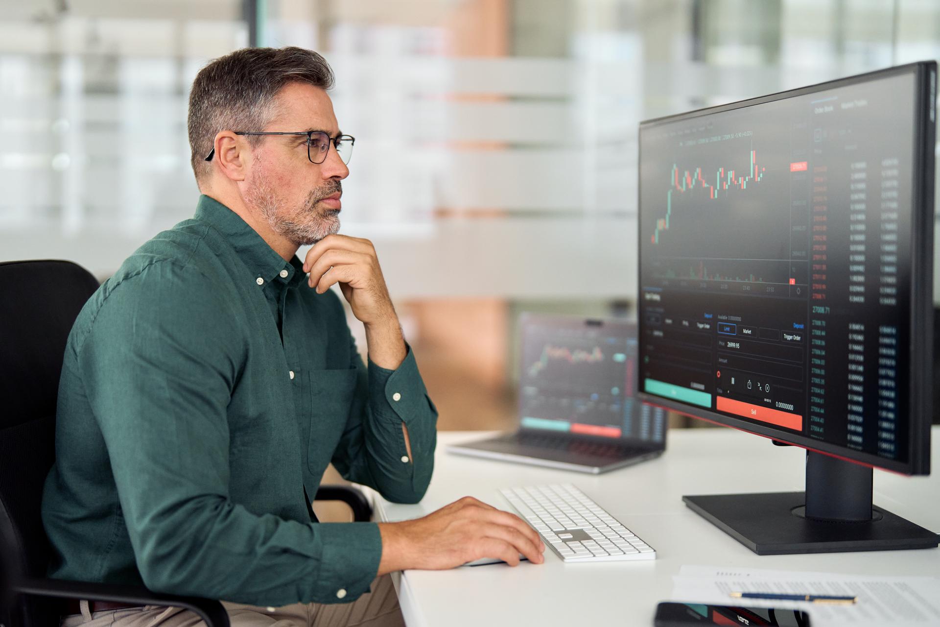 A man reviewing changes in stock prices