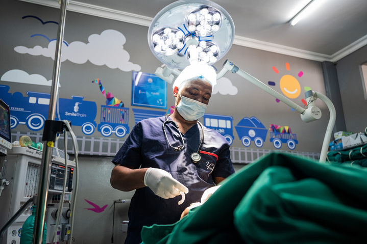 Male doctor with patient at Smile Train