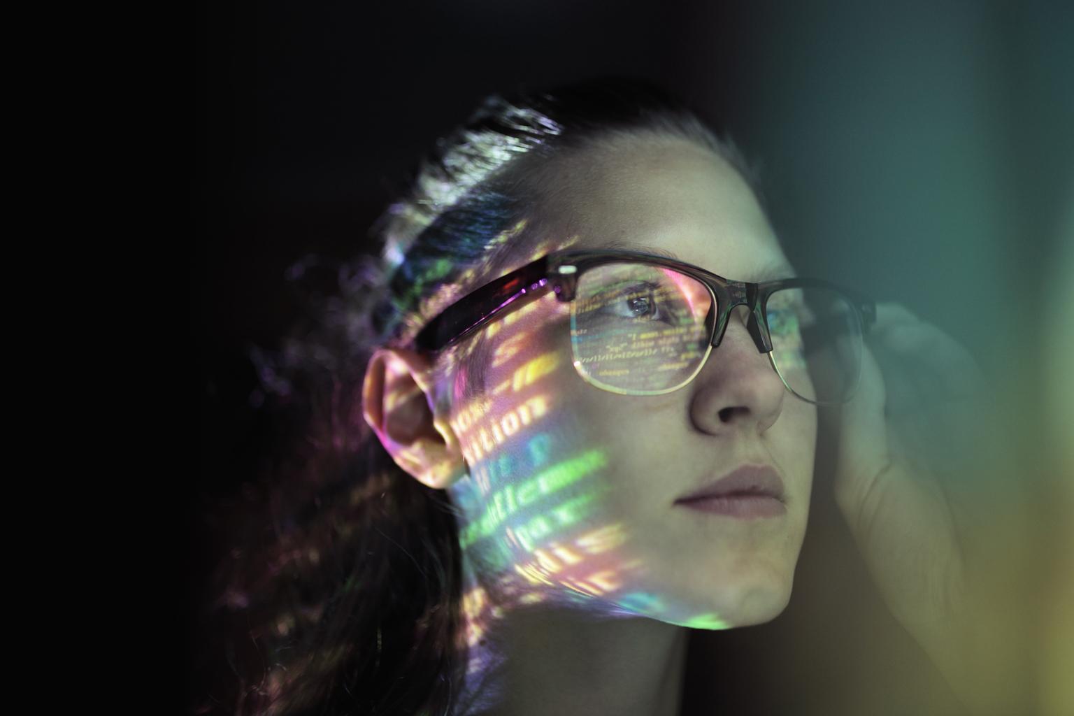 Portrait, girl lighted with colorful code