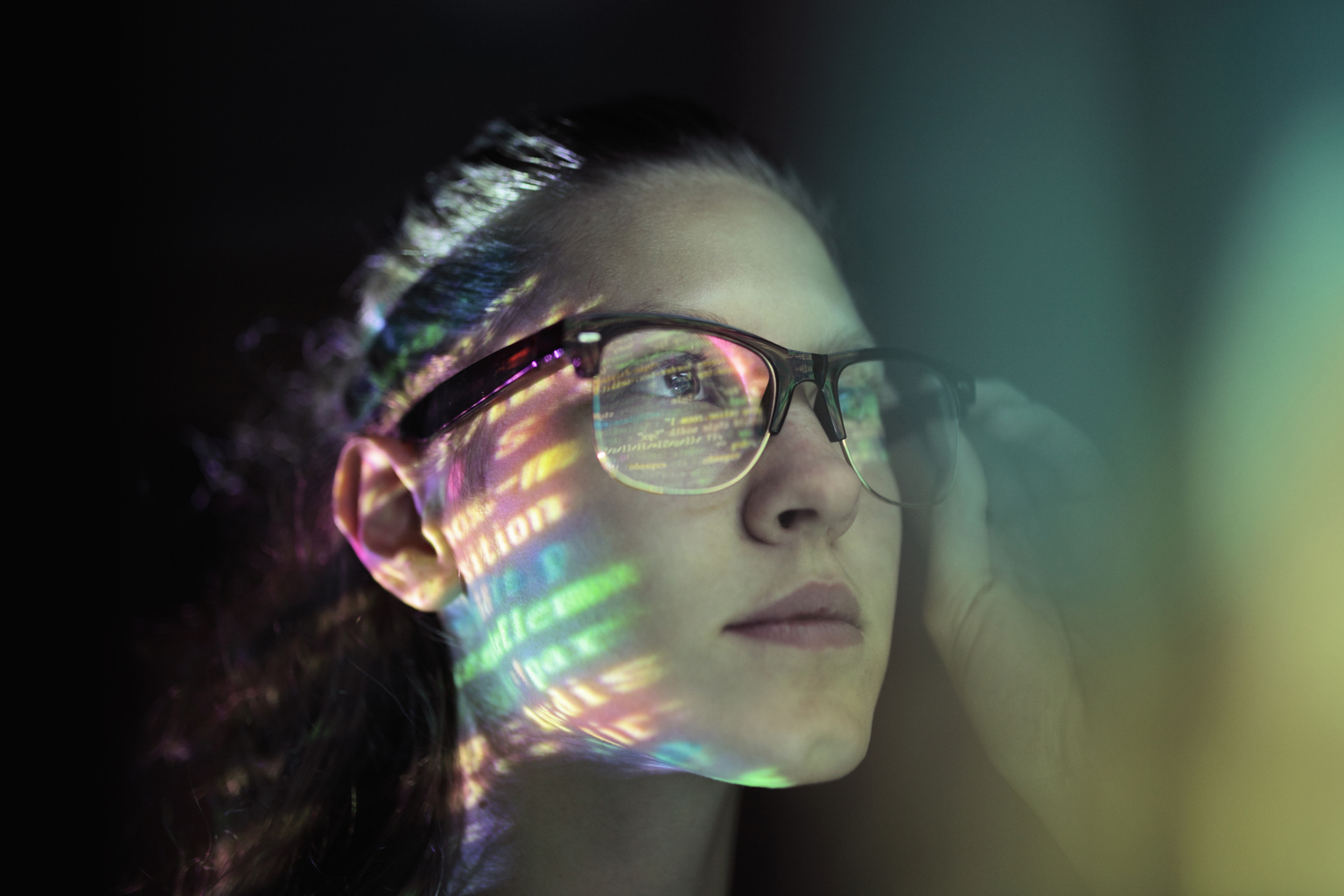 Portrait, girl lighted with colorful code (Extended)