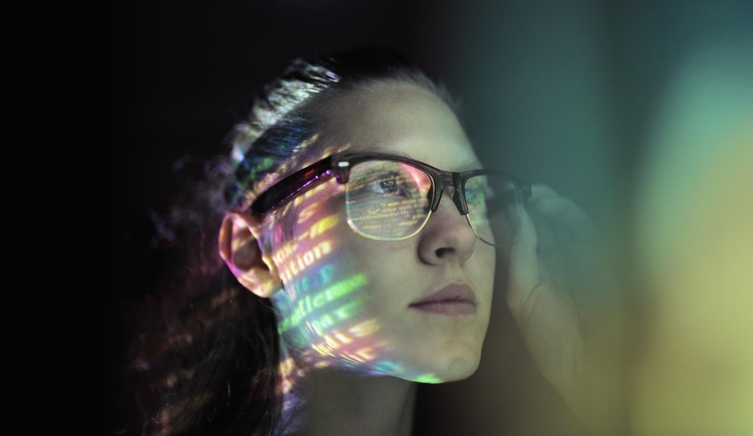 Portrait, girl lighted with colorful code