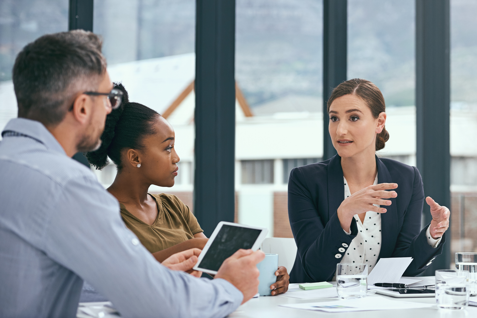 A group of colleagues having a meeting in an office