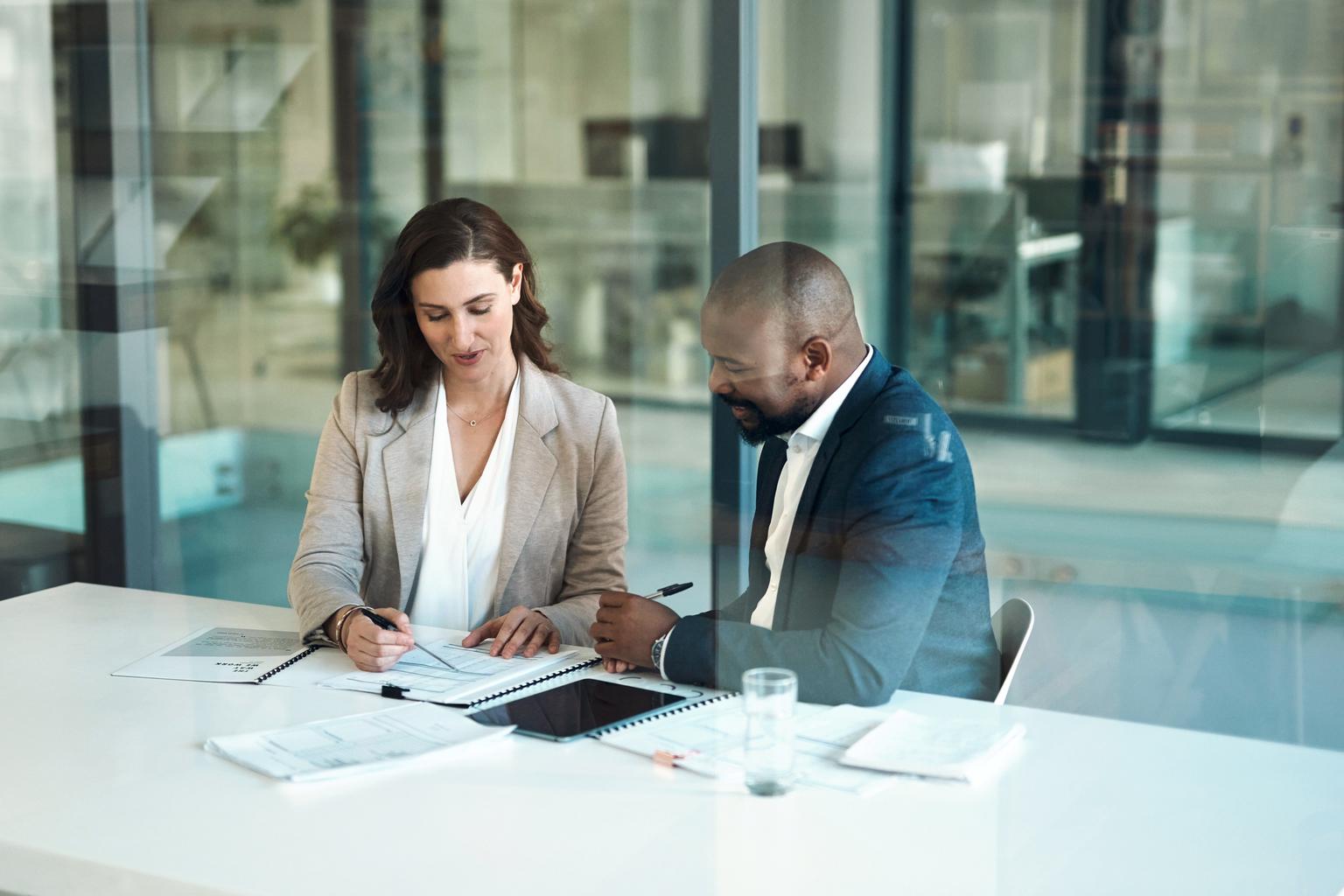 a man and a woman sitting at a table