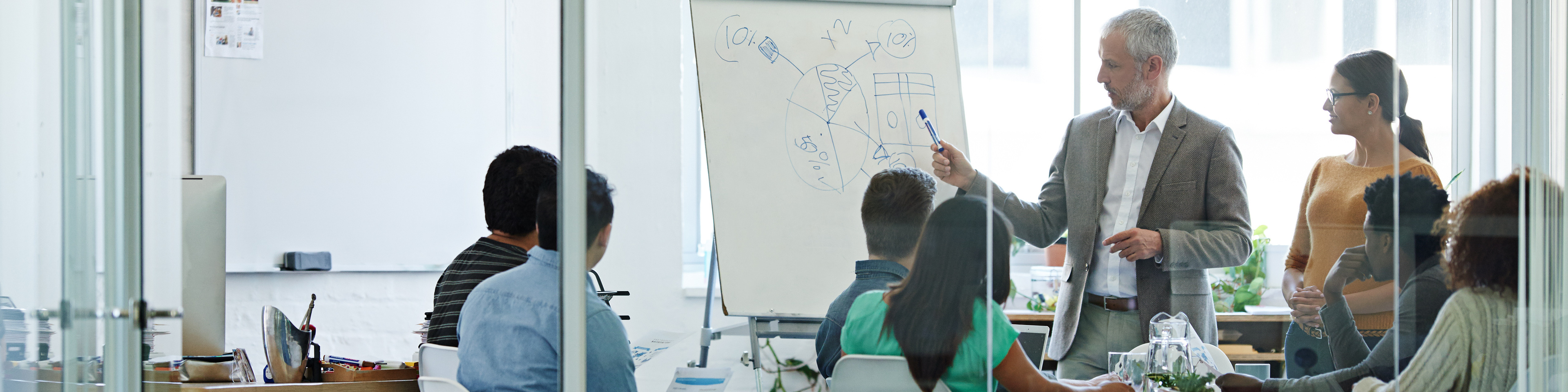 Group of coworkers in a boardroom meeting