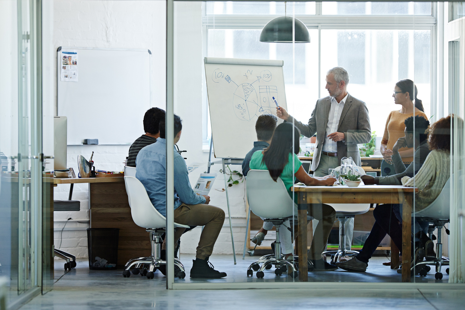 Group of coworkers in a boardroom meeting