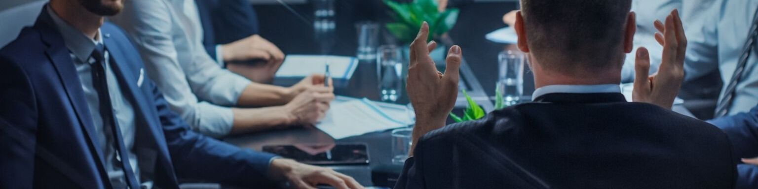 People having a business meeting in a conference room in office from Canva