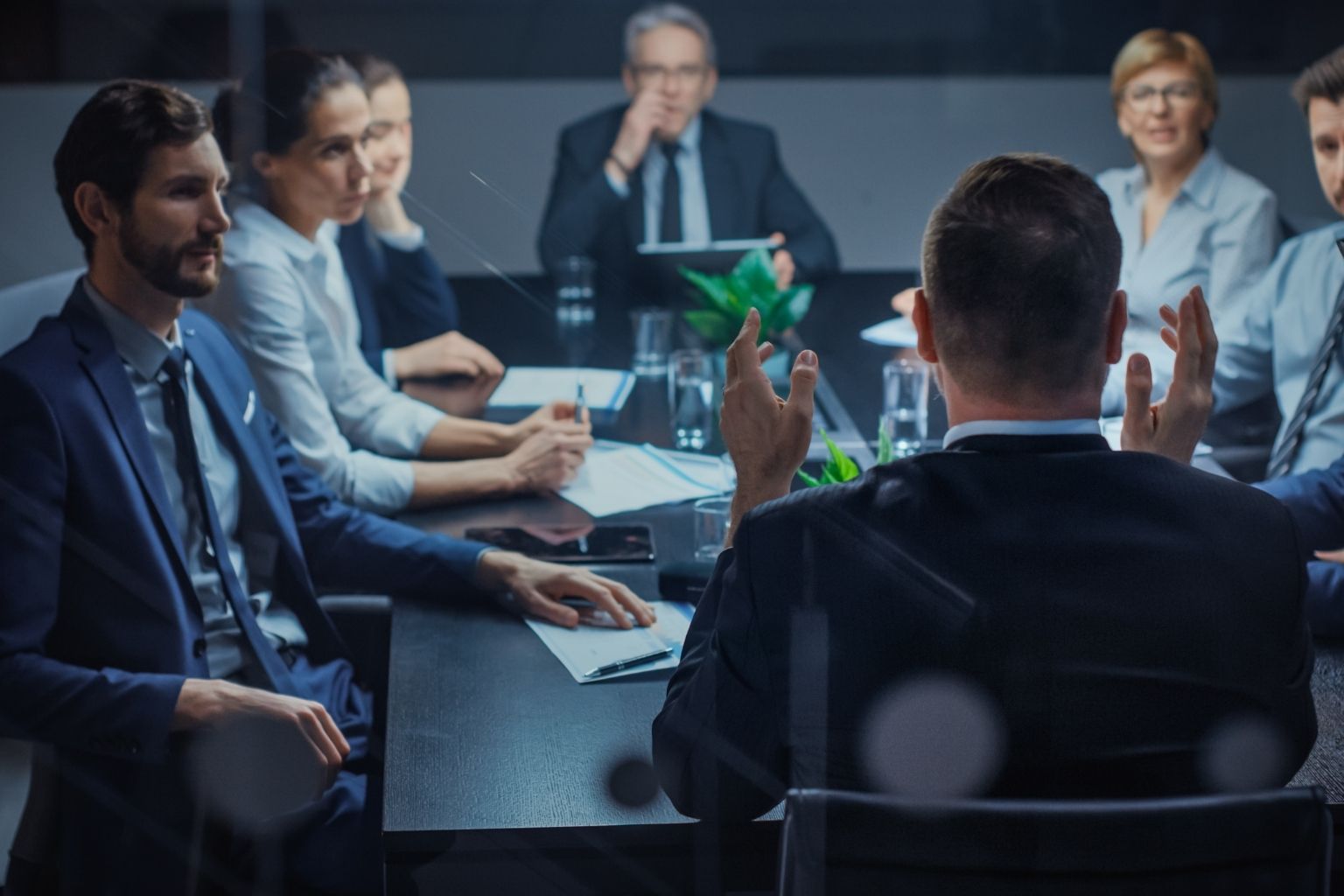 People having a business meeting in a conference room in office from Canva