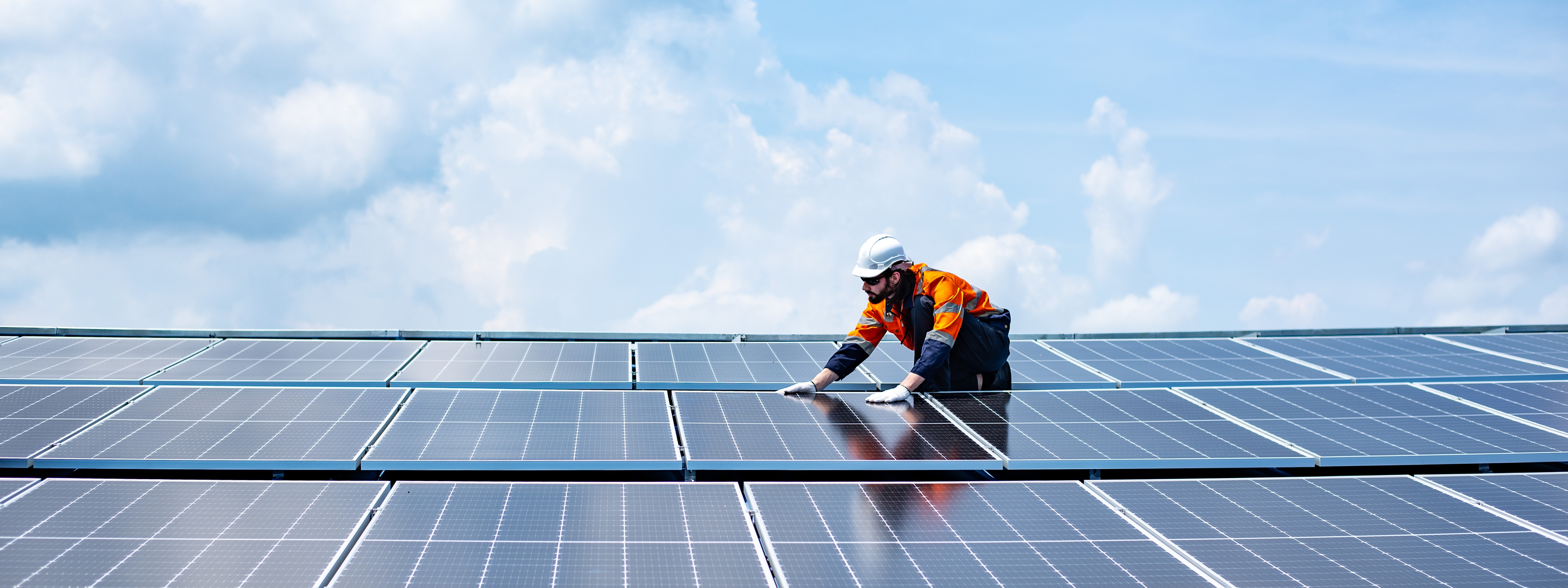 Engineer service check installation solar cell on the roof of factory , Sustainable energy industry concept, Renewable energy solution for climate change