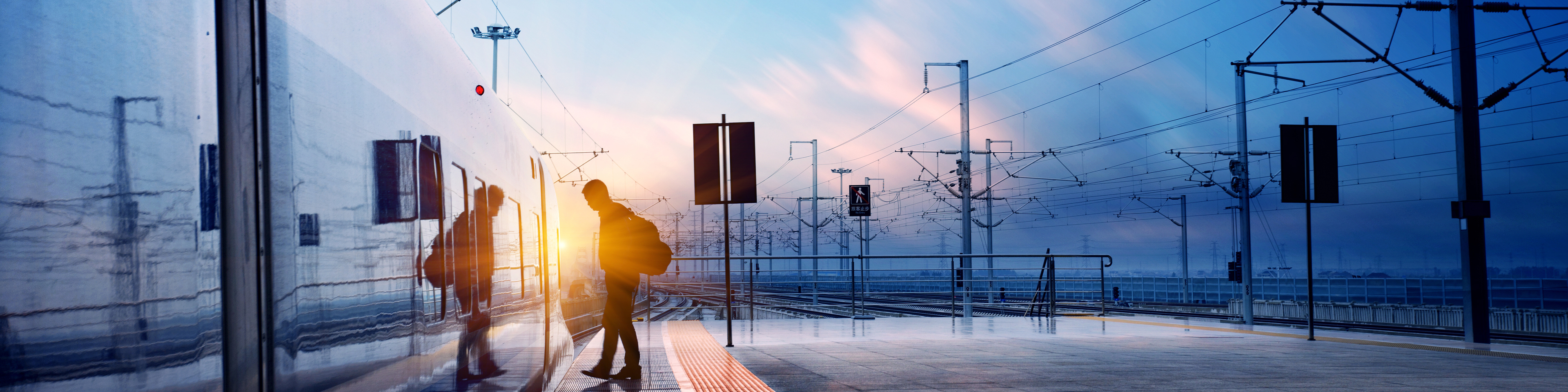 train stop with sunset