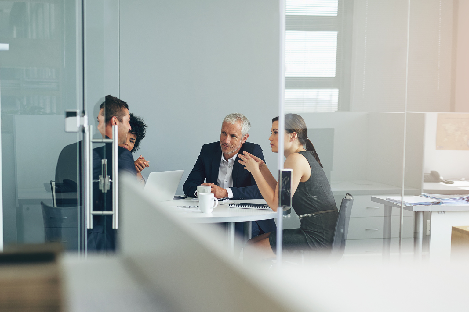 Business people having a meeting together in an office.