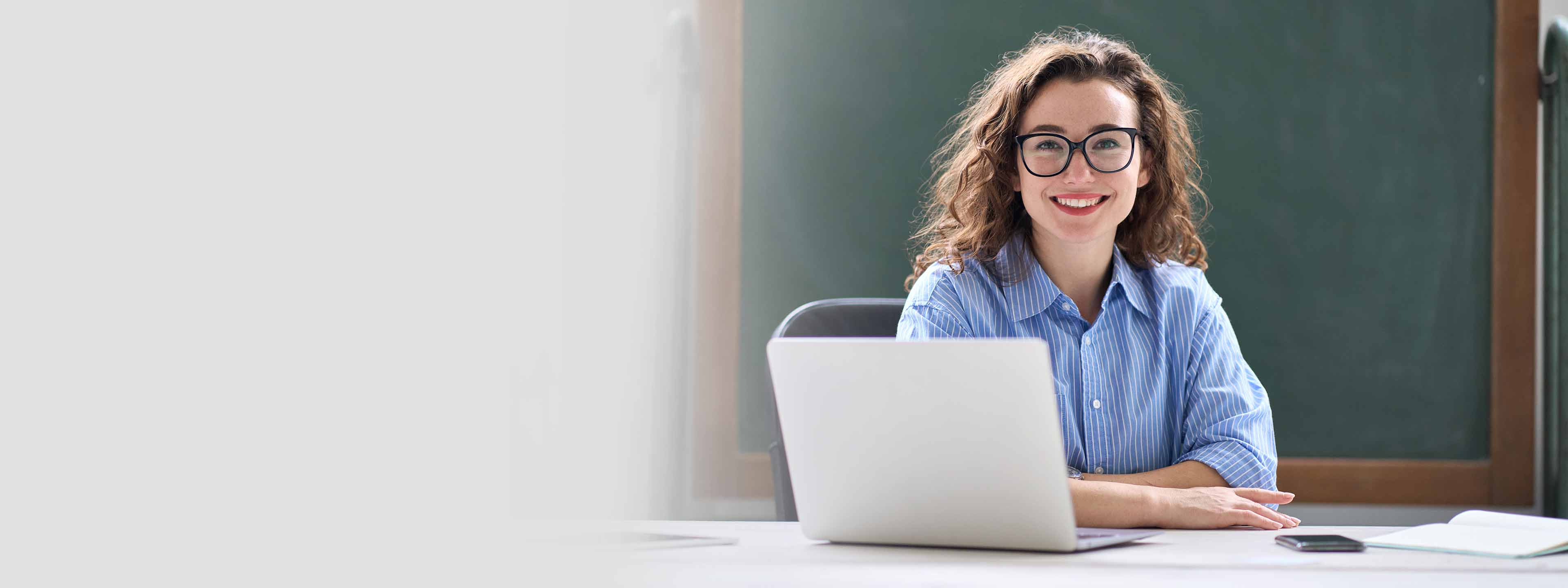 woman looking at a laptop