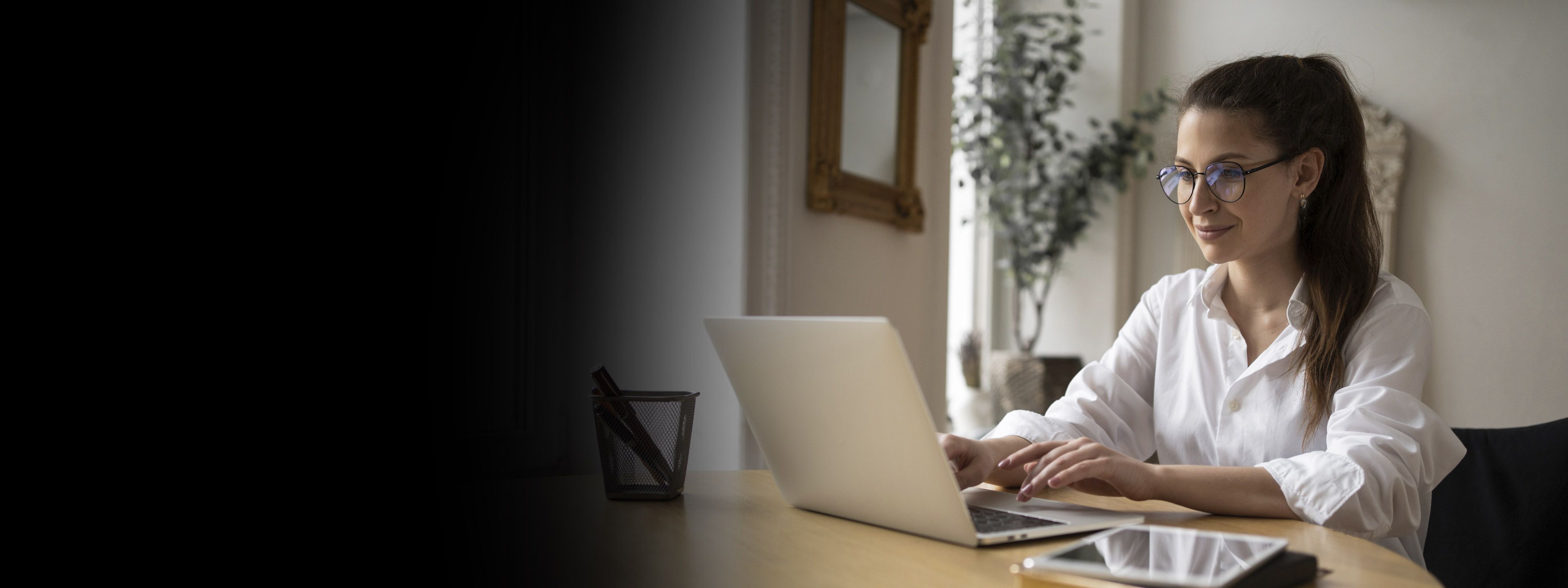 Woman looking at a laptop