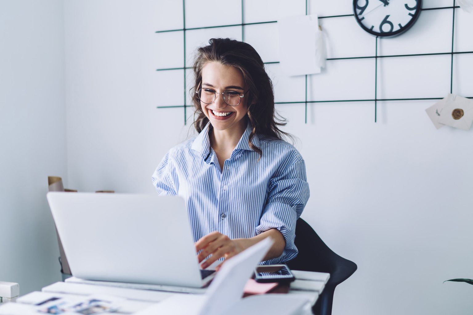 Woman looking at laptop screen