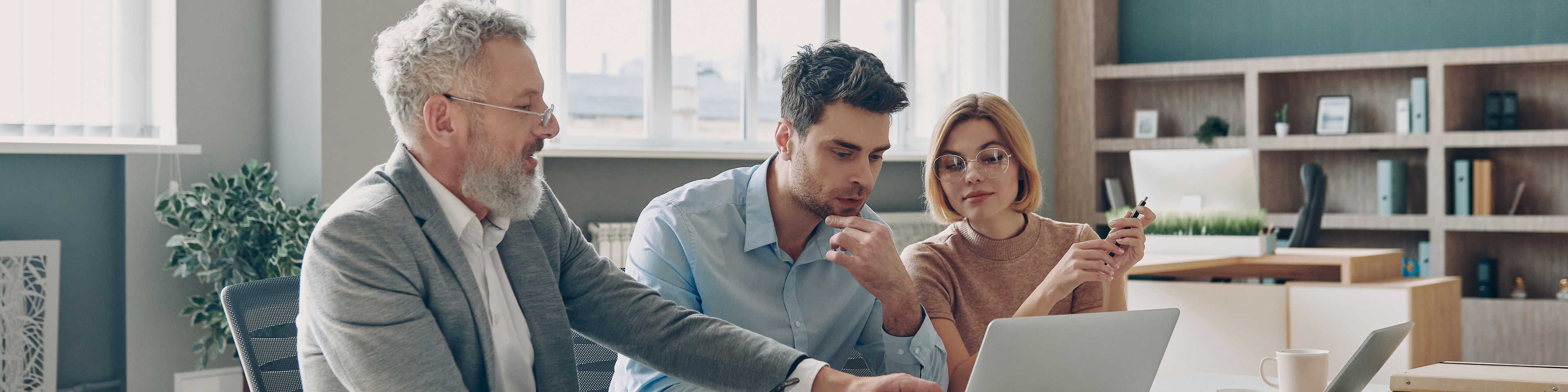 Three business people having discussion