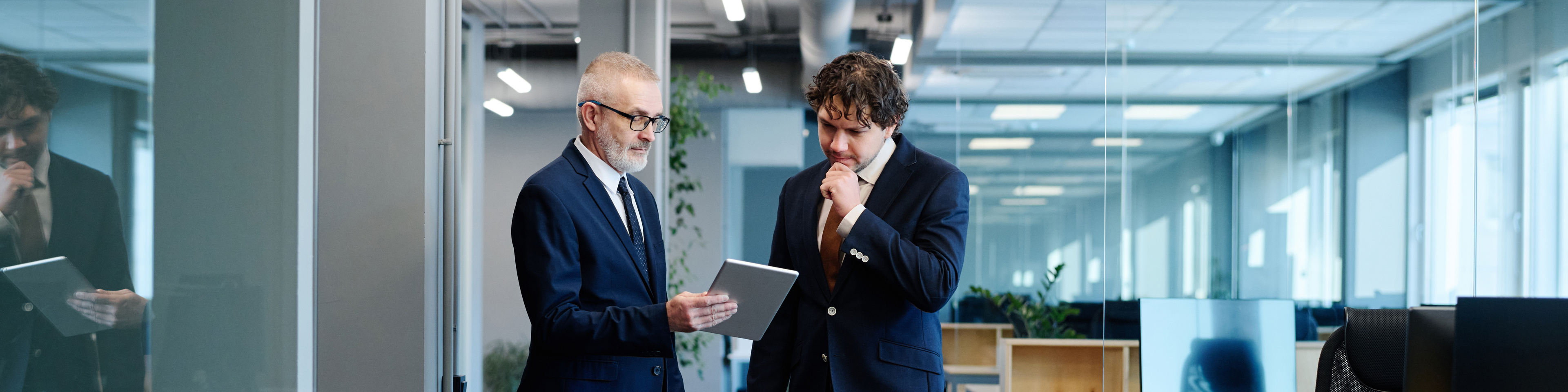 Businessmen discussing in office