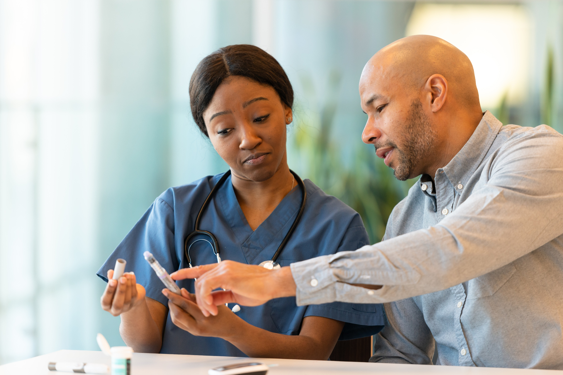 Two medical professionals working together