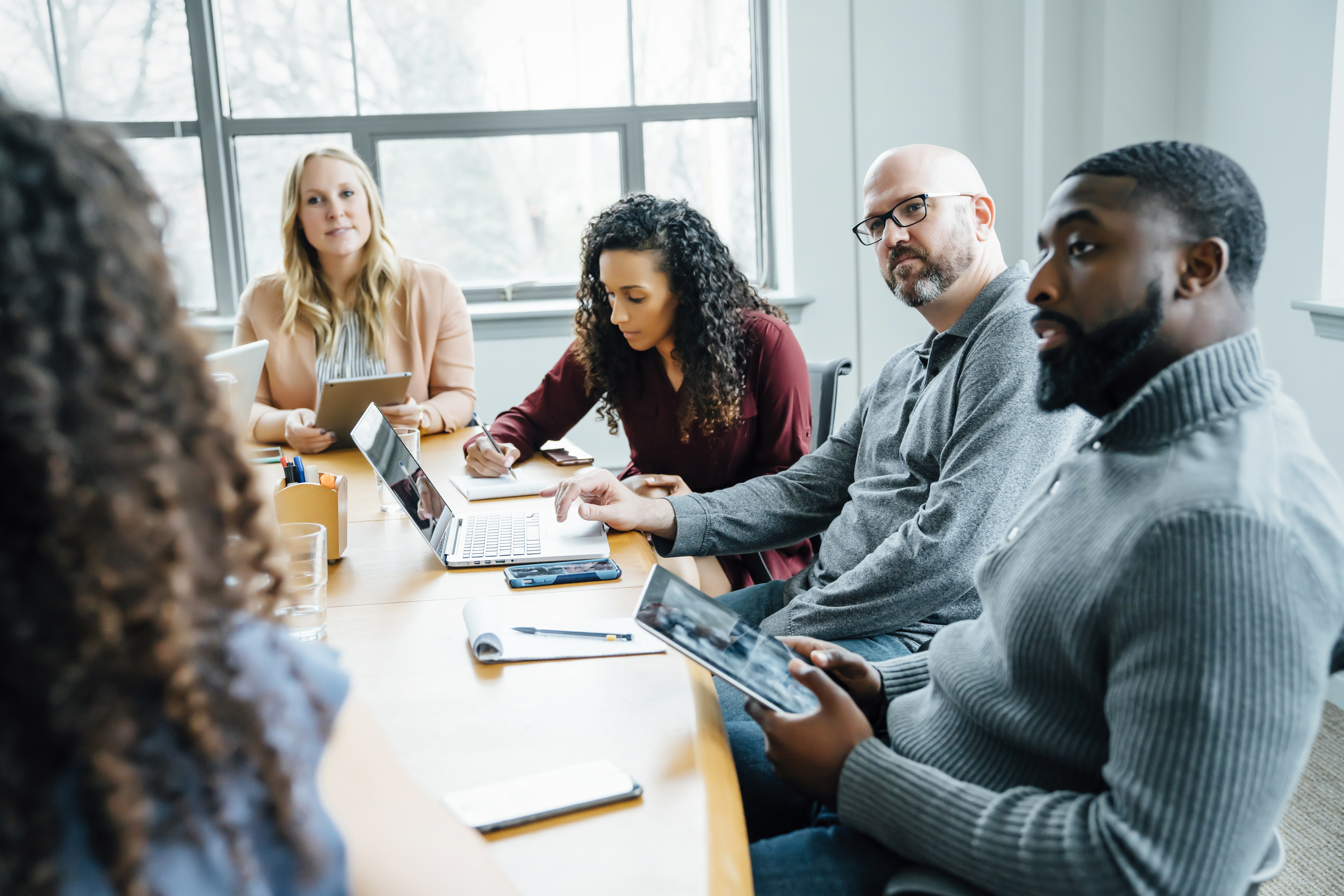 Business people listening in meeting