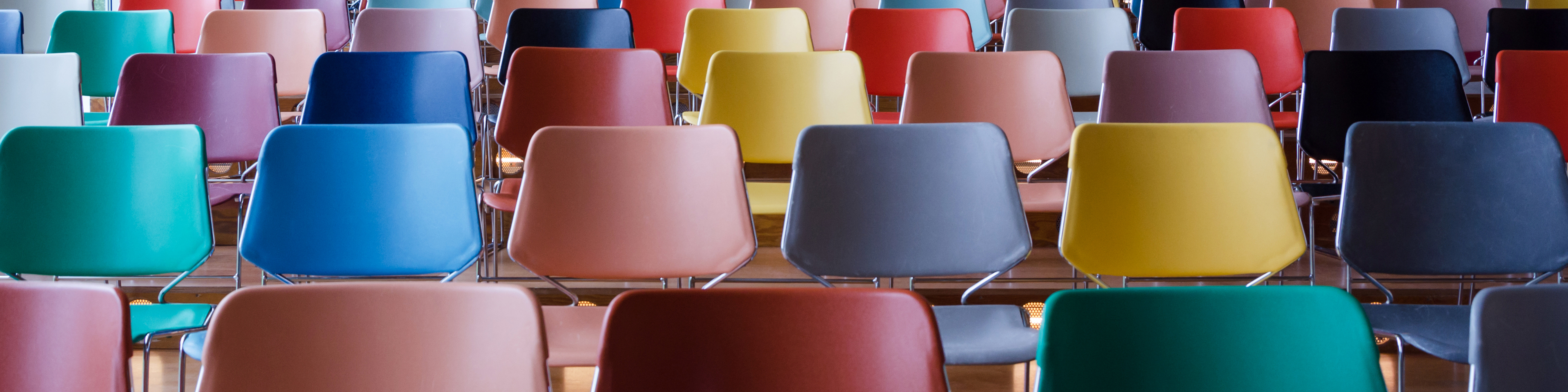 Rows of colorful empty chairs