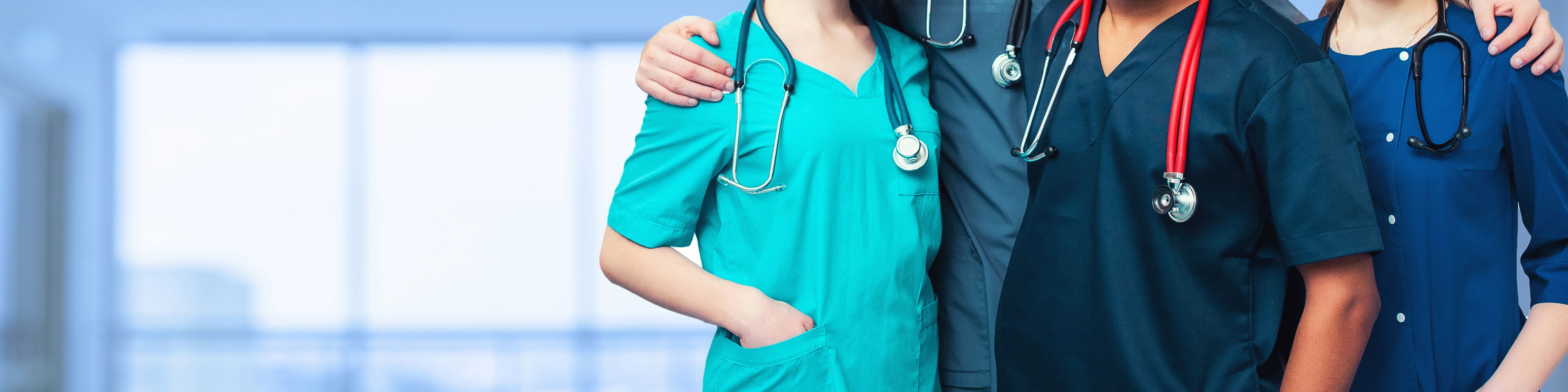 Group of faceless doctors posed together