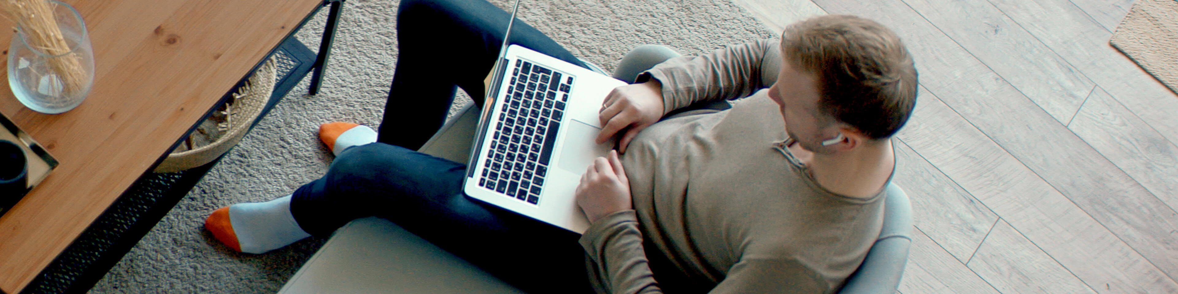 woman typing on a laptop; hands close-up