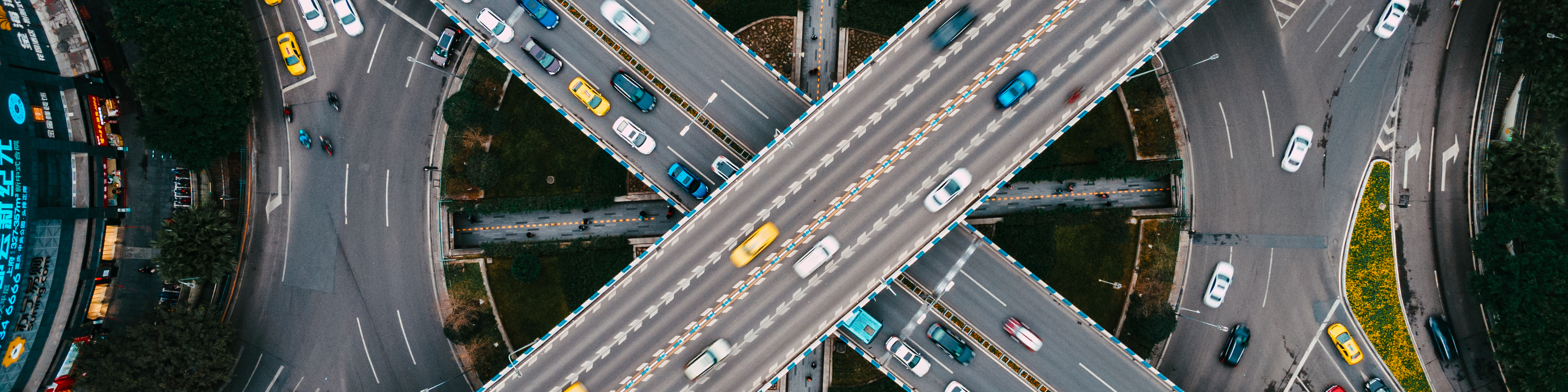 Top View of Road Intersection and Busy Overpass