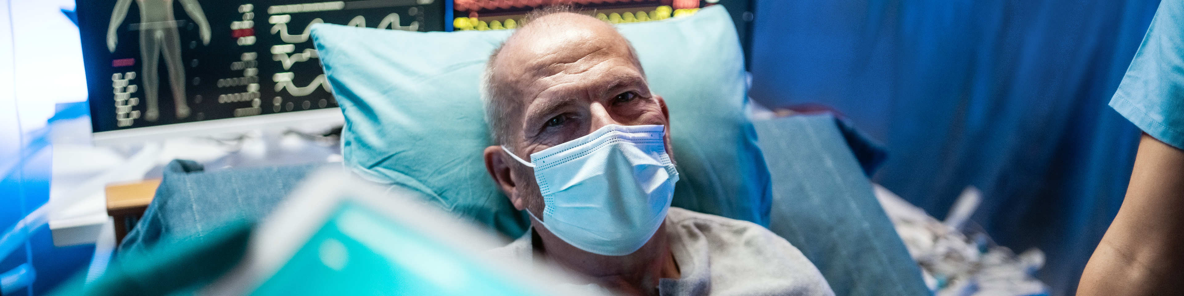 mature man patient in hospital bed