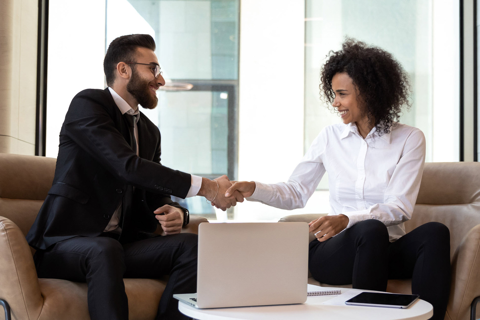 Man and woman shaking hands